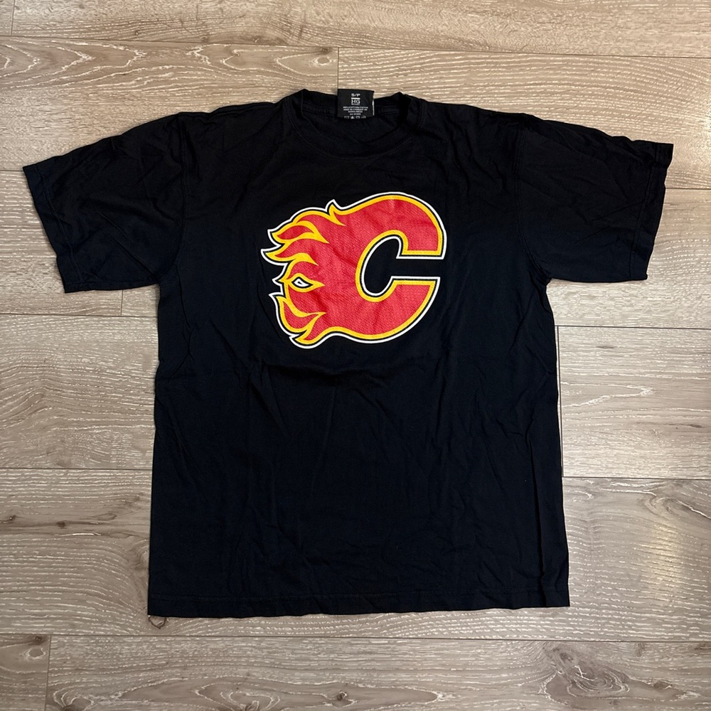 NHL Calgary Flames Black Tee with Red and Yellow Graphic